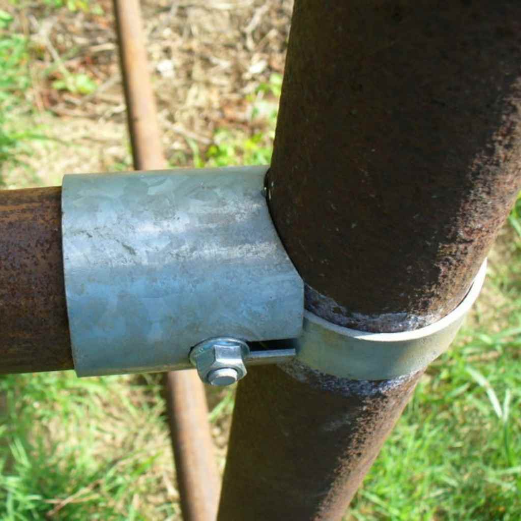 Bird&#39;s eye view of a straight Fence Bullet sleeve installed. We&#39;ve coped the sleeve to fit securely to pipe for a strong fence brace that is easy to install and requires no specialized equipment 