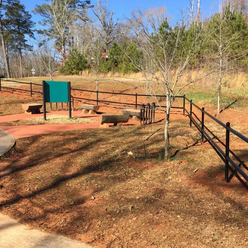 Two rail pipe fence installed using black powder coated pipe and painted fence kits available at Bullet Fence Systems. Save time and money today on your pipe fencing project, big or small, with Bullet Fence. 