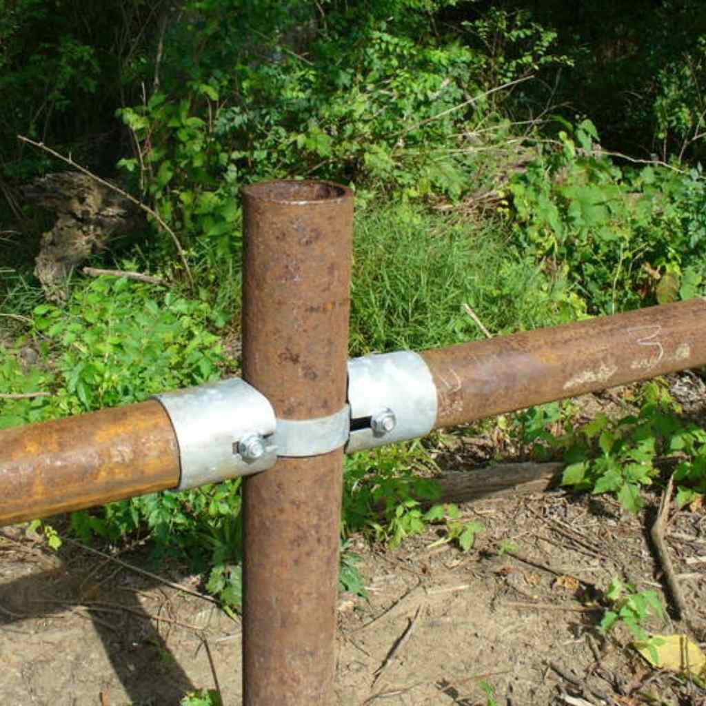 Pipe rail fence built using Fence Bullets (no weld pipe connectors) available from Bullet Fence Systems and used oilfield pipe. 